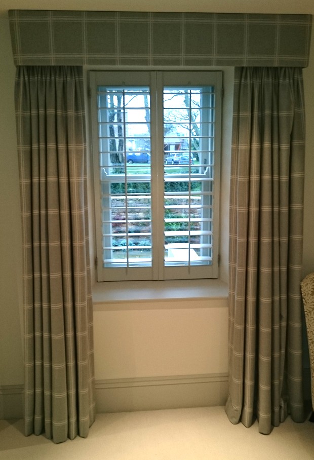 Shutter and curtain combination for total blackout effect.